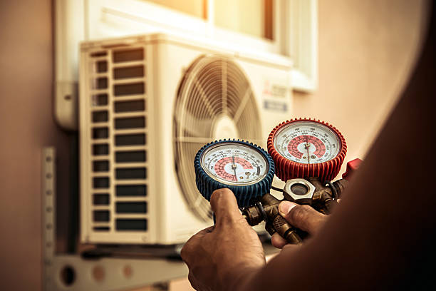 Professional Heat Pump Repair technician working in Spencer, WV